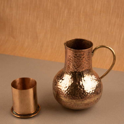 Round Copper Water Jug and glass